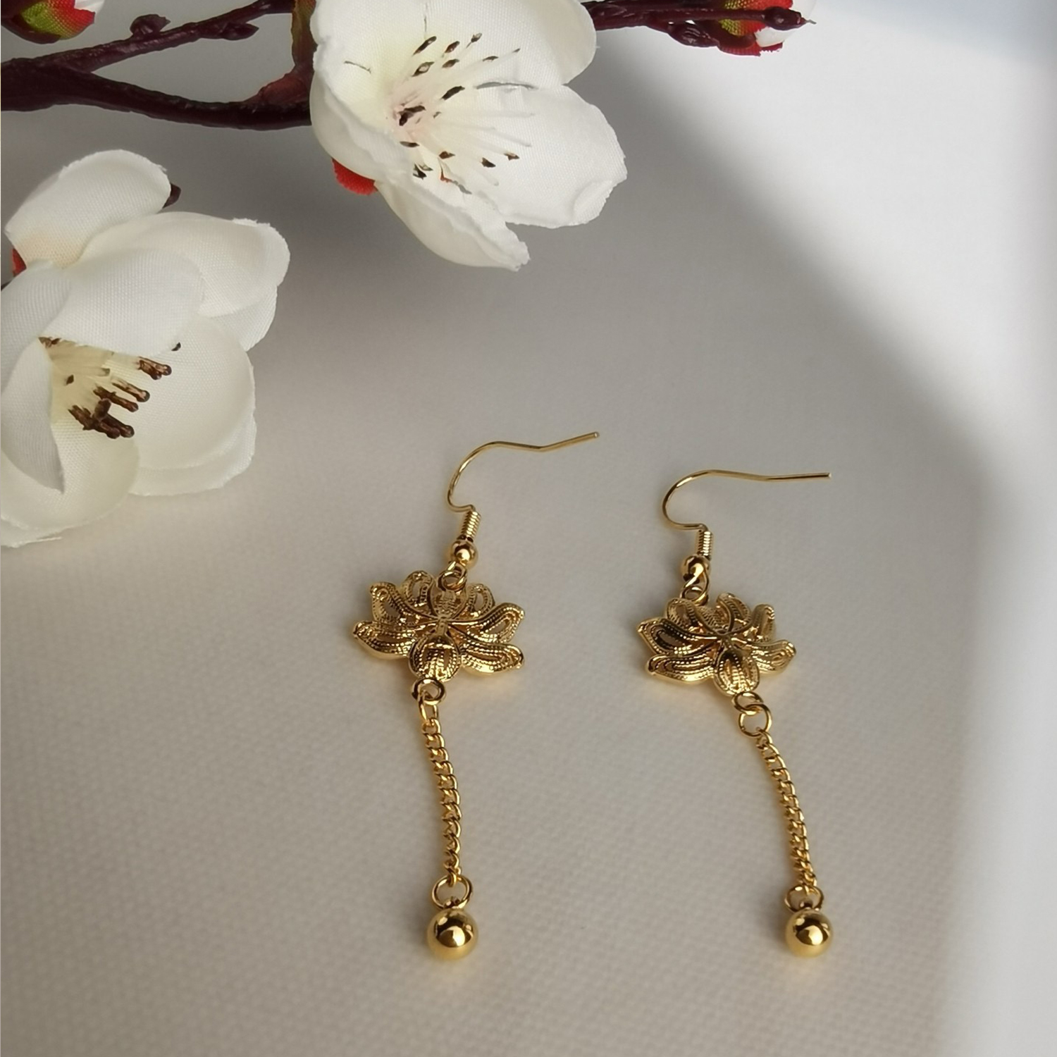 Alluvial Gold Vacuum Electroplating 24K Gold Lotus Tassel Earrings