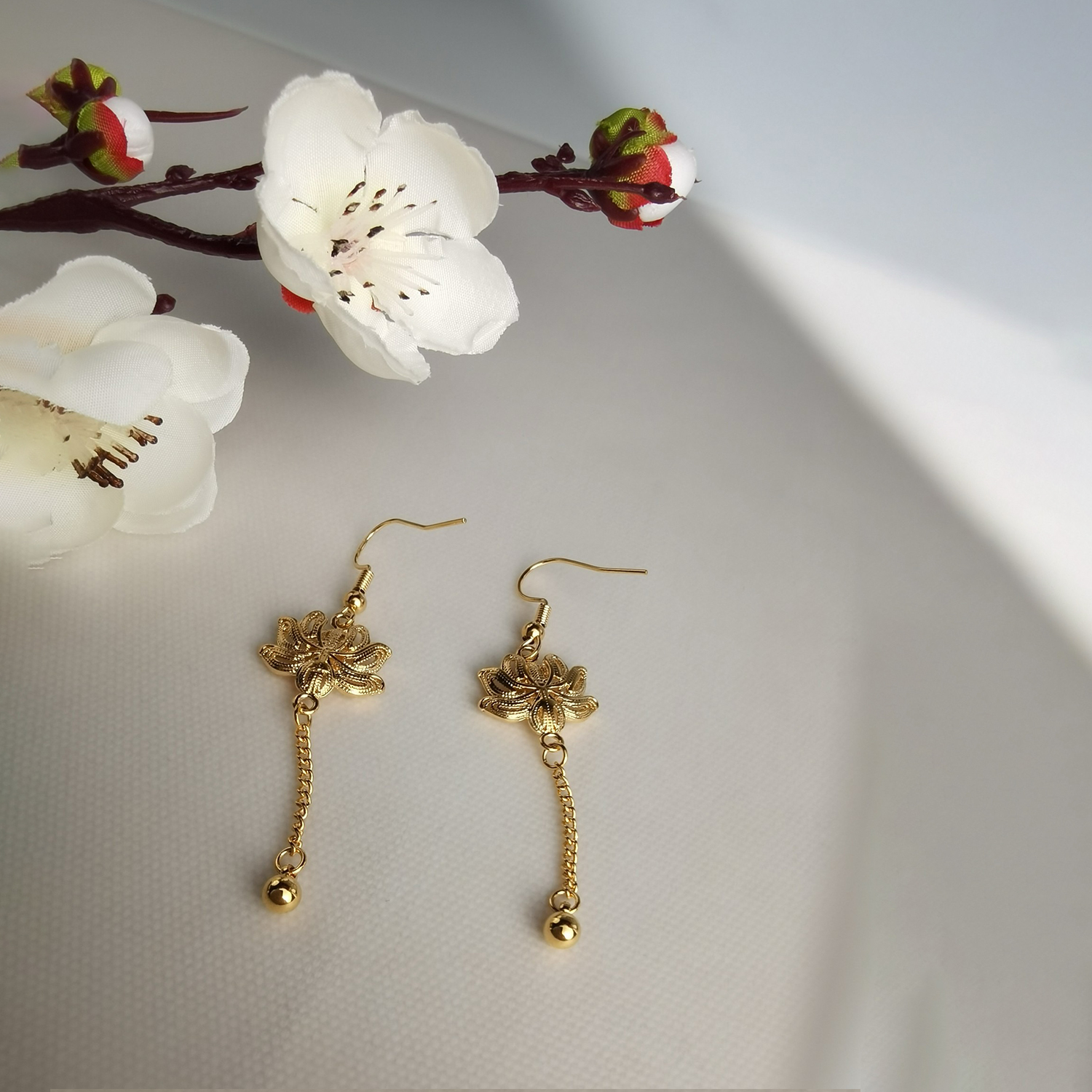 Alluvial Gold Vacuum Electroplating 24K Gold Lotus Tassel Earrings