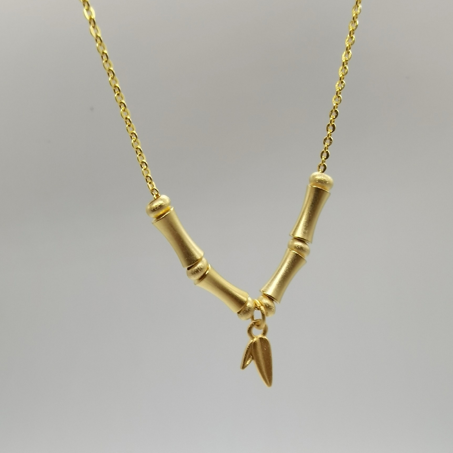 Alluvial gold ancient method vacuum electroplating 24K gold Bamboo peace necklace